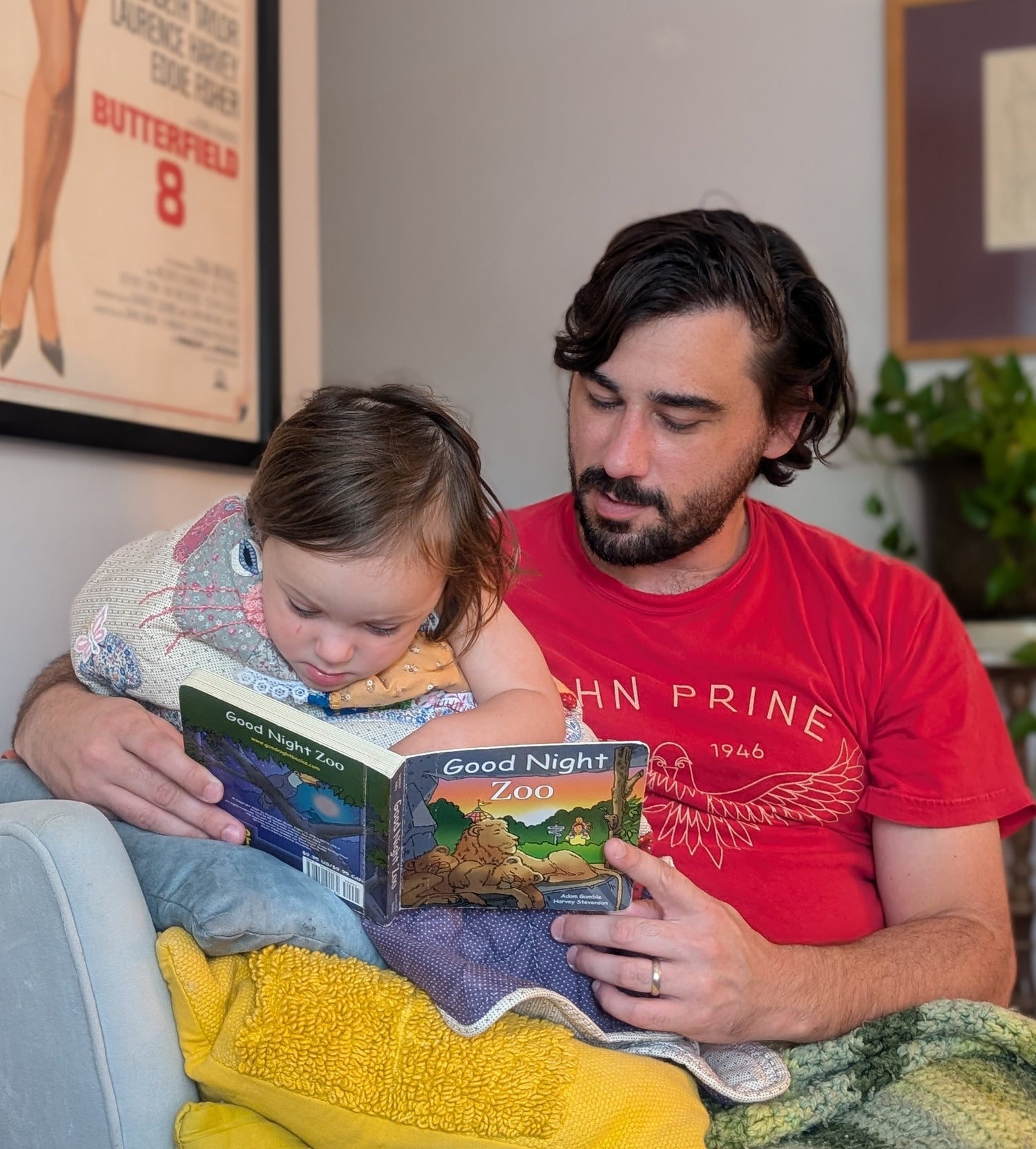 Author John Berdux reading to his daughter in Charleston, SC.